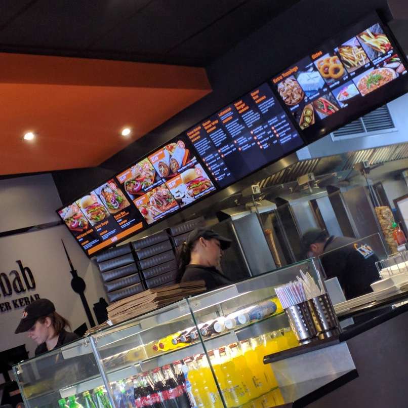 Digital menu boards in kebab shop